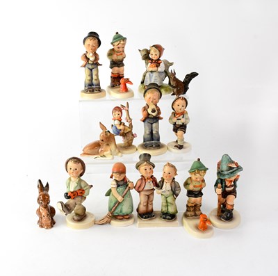 Lot 554 - HUMMEL GOEBEL; thirteen figures of children to...