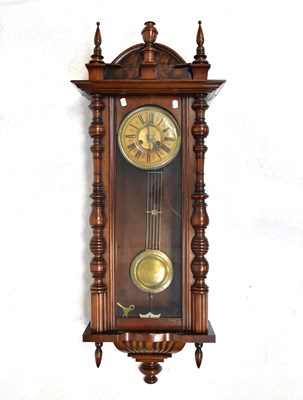 Lot 134 - A large walnut cased spring-driven Vienna wall...