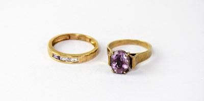 Lot 1053 - A 9ct gold ring set with amethyst in a raised...