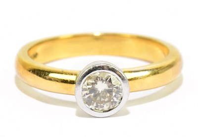 Lot 905O - An 18ct yellow gold diamond set single stone...