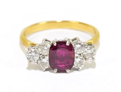 Lot 905Q - An 18ct yellow gold ruby and diamond set seven...