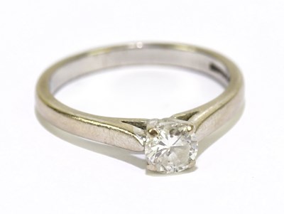 Lot 995 - An 18ct white gold diamond solitaire ring,...