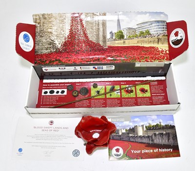 Lot 580 - PAUL CUMMINS; a limited edition ceramic poppy,...