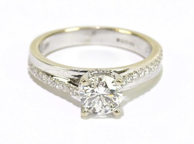Lot 989 - An 18ct white gold diamond solitaire ring,...