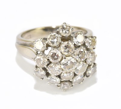 Lot 1240 - A white metal diamond floral cluster ring