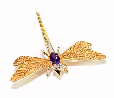 Lot 1212 - A yellow metal diamond and amethyst set brooch