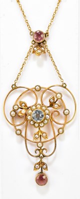 Lot 1238 - A 9ct yellow gold Edwardian pendant on curb link chain