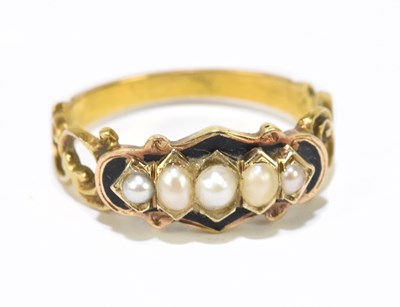 Lot 1257 - A Victorian yellow metal seed pearl and black enamel mourning ring
