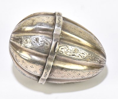 Lot 1205 - A Continental white metal lidded box in the form of an egg