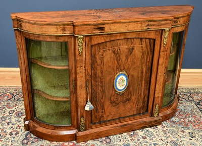 Lot 1529 - A Victorian walnut credenza with bowfronted...