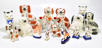 Lot 1258 - A group of Staffordshire spaniels and other...