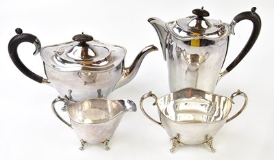 Lot 1033 - A George V hallmarked silver four piece tea...