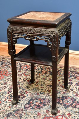 Lot 1811 - A Chinese carved rosewood jardinière stand...