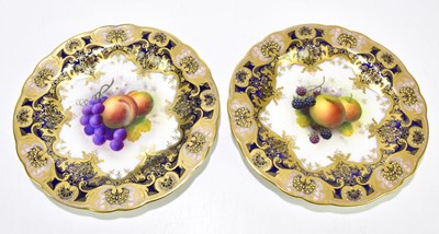 Lot 1621 - A SHUCK FOR ROYAL WORCESTER; a pair of cabinet...