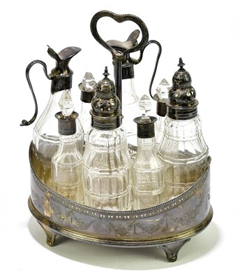 Lot 1115 - A George III hallmarked silver condiment stand...