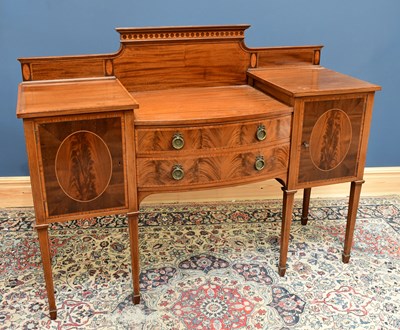 Lot 1548 - An Edwardian inlaid mahogany sideboard, the...