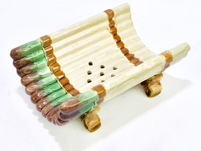 Lot 1311 - A majolica asparagus platter, 20cm.