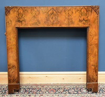 Lot 1626 - A 1940s walnut fire surround, height 136cm,...