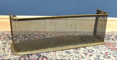 Lot 1157 - A 19th century brass and mesh fronted fender,...