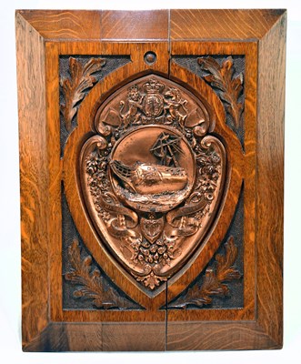 Lot 1005 - An oak and coppered metal commemorative ship...