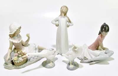 Lot 1731 - LLADRO; three assorted figures to include a...