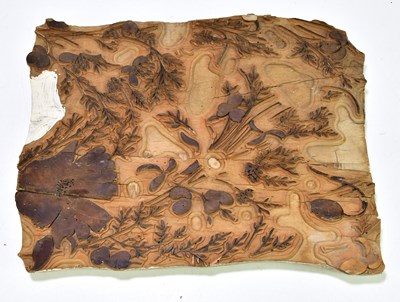 Lot 1066 - A floral decorated printing block, 42 x 23cm.