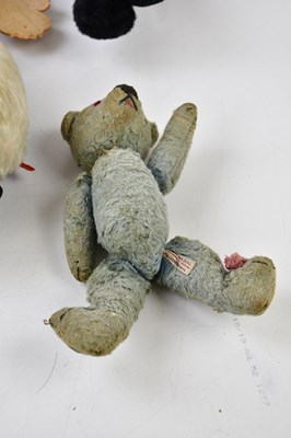 Lot 321 - A group of five plush toys to include a plush...