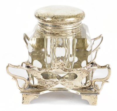 Lot 1138 - JOHN ROUND; an Edwardian hallmarked silver mounted cut glass inkwell and base