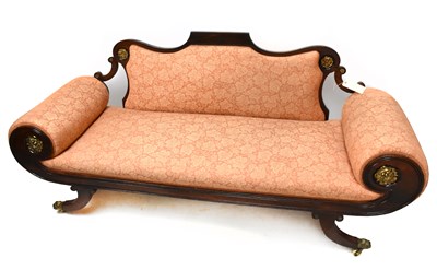 Lot 1573 - A Regency style Irish stained beech scroll end settee