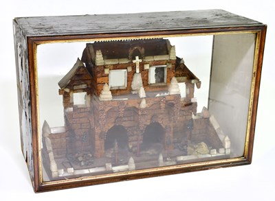 Lot 1011 - A cased Victorian diorama of a church, height...