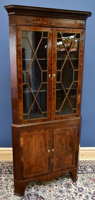 Lot 1551 - A 19th century mahogany freestanding corner...