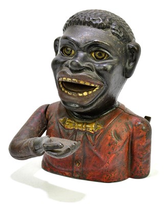 Lot 1089 - A mechanical money box, height 15cm.