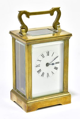 Lot 1467 - A brass carriage clock, the dial set with...