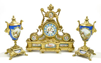 Lot 1472 - A French three piece clock garniture, the...