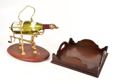 Lot 1007 - A champagne pourer, together with a mahogany...