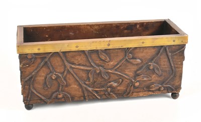 Lot 1022 - A rectangular planter carved with mistletoe,...