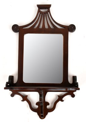 Lot 1088 - A small mahogany mirrored wall bracket, 51cm.