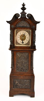 Lot 1476 - A miniature oak cased longcase clock, the dial...