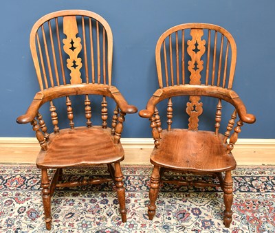 Lot 1534 - Two elm Windsor elbow chairs on turned...