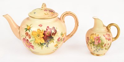 Lot 1341 - ROYAL WORCESTER; a blush ivory teapot,...