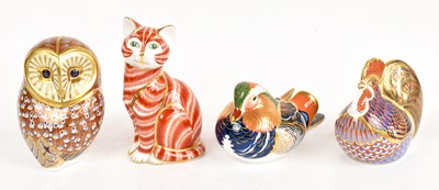 Lot 1295 - ROYAL CROWN DERBY; four paperweights to...