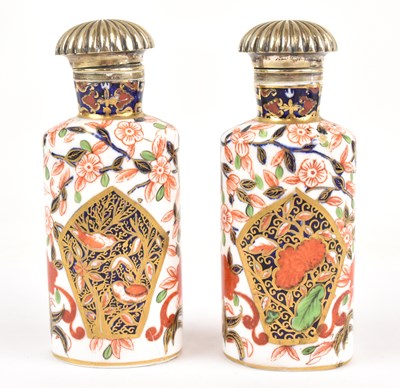 Lot 1357 - A pair of Derby Imari pattern scent bottles,...