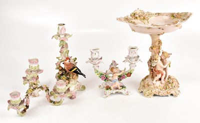 Lot 1302 - A Continental porcelain figure group, together...