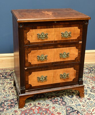 Lot 1609 - A chest of three short drawers beneath...