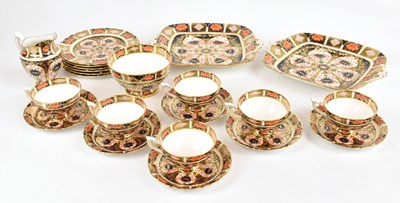 Lot 1286 - ROYAL CROWN DERBY; an Imari pattern part tea...