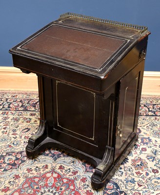 Lot 1608 - A Victorian ebonised and inlaid Davenport,...