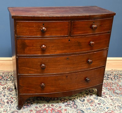 Lot 1623 - A 19th century mahogany bowfront chest of two...