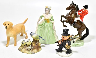 Lot 1265 - A group of five figures to include a Beswick...