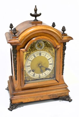 Lot 1374 - A German walnut eight day mantel clock with...