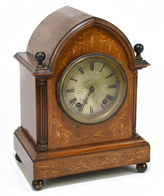 Lot 1376 - An Edwardian rosewood and inlaid lancet shaped...